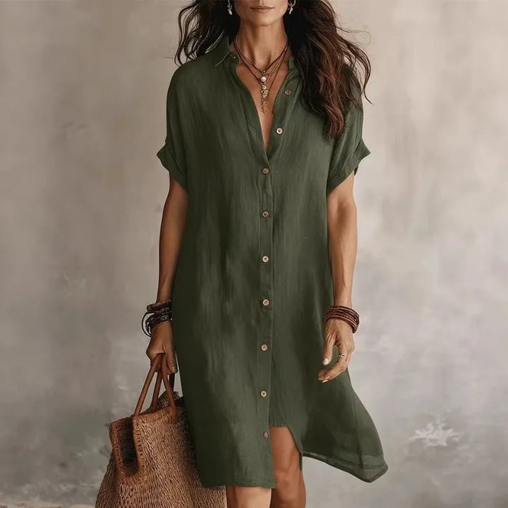 Close-up view of button down shirt dress showing collar neckline and front button closure detail