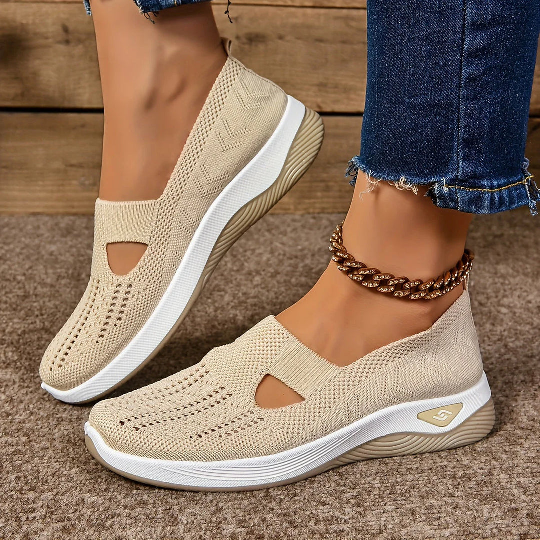 Close-up view of non-slip orthopedic shoes showing textured knit construction and cutout detail