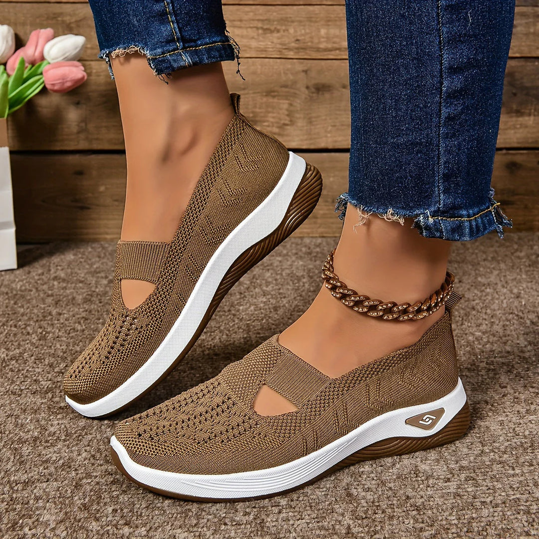Women's platform sneakers with non-slip sole worn with casual denim jeans