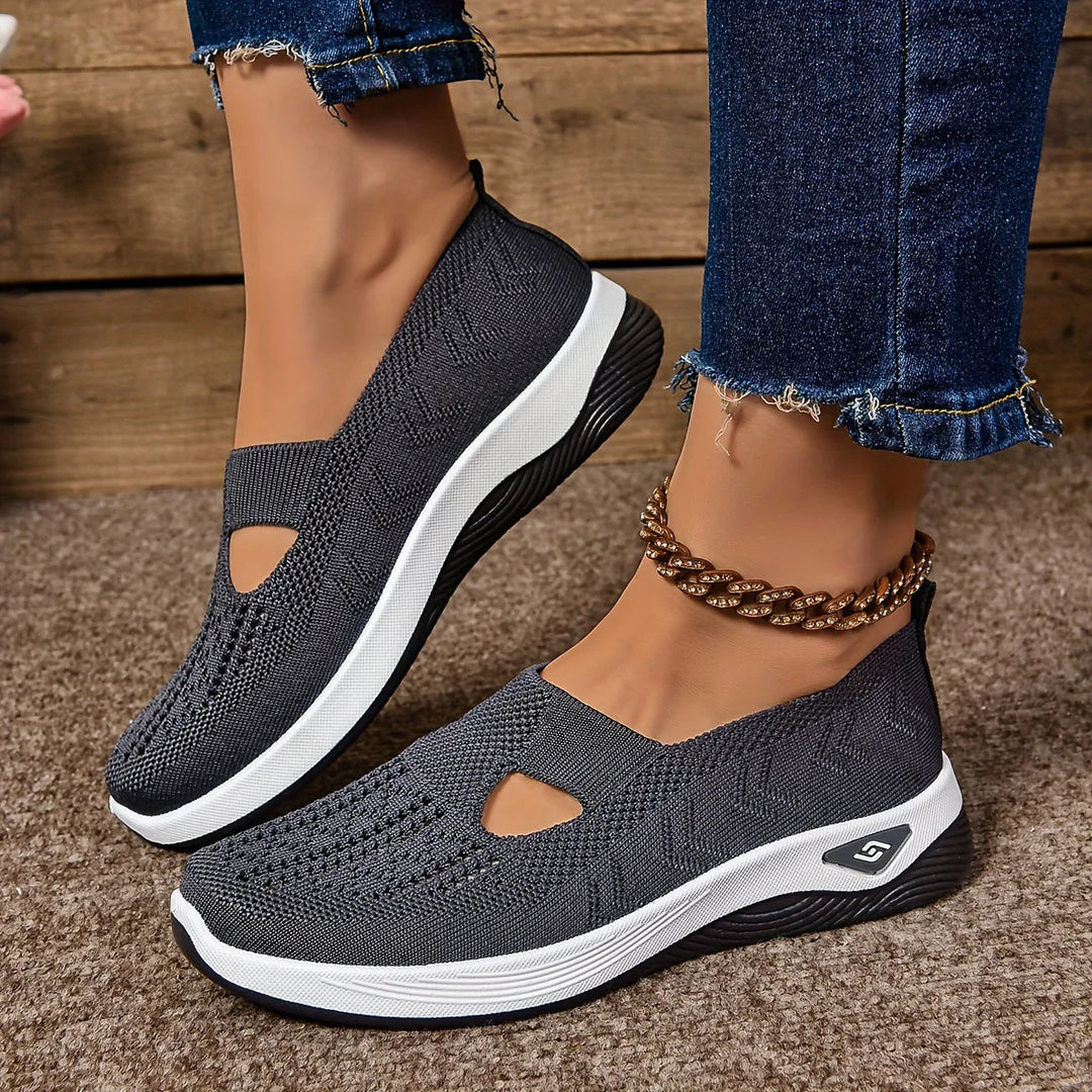 Close-up of orthopedic shoe heel counter and rocker bottom design for walking support