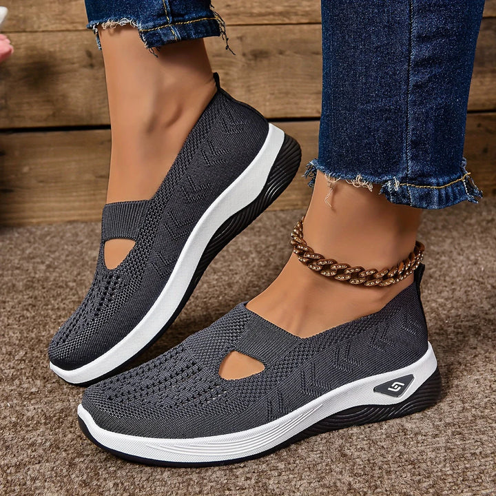 Close-up of orthopedic shoe heel counter and rocker bottom design for walking support