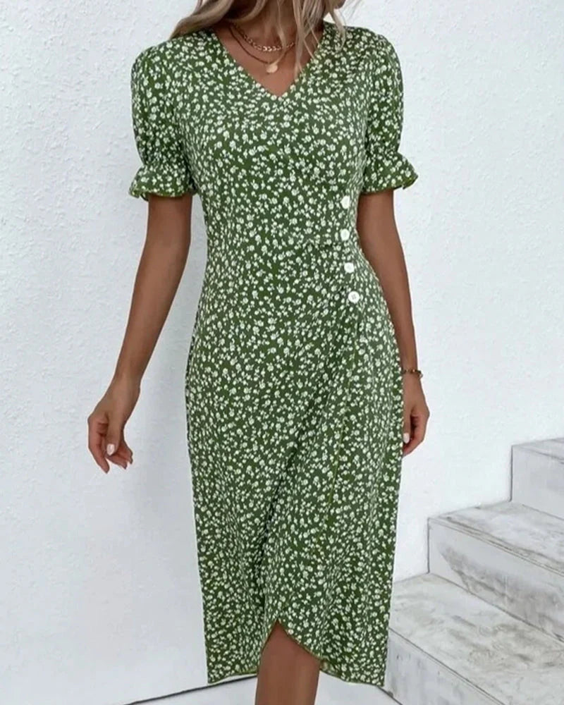 Full-length view of the cotton summer dress styled with a woven handbag