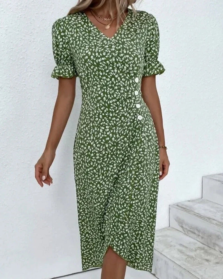 Full-length view of the cotton summer dress styled with a woven handbag