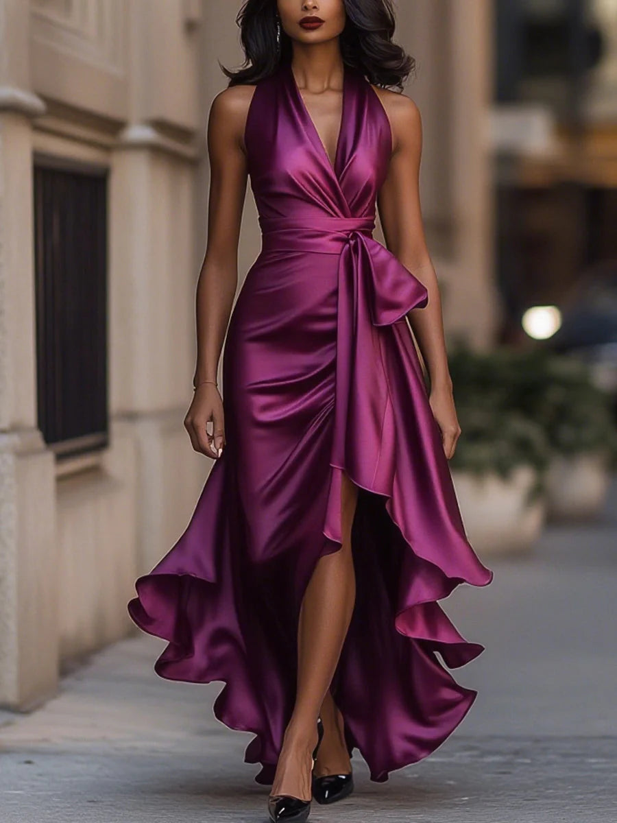Halter neck ruffle maxi dress styled for formal event showing floor-length silhouette