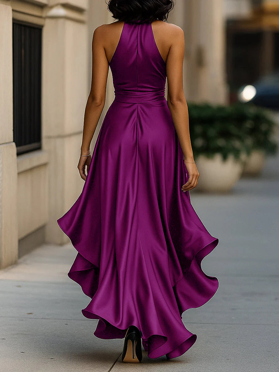 Close-up of wrap waist tie detail on halter neck ruffle maxi dress