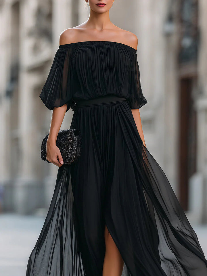 Pleated maxi dress with defined waist and flowing skirt for weddings