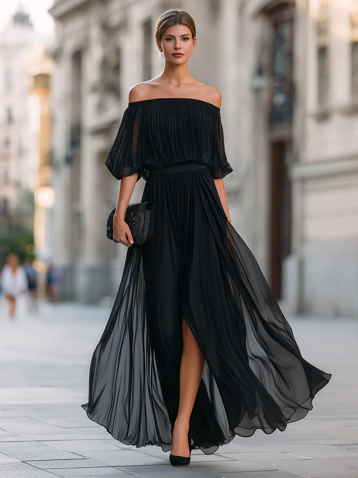 Formal off shoulder maxi dress with pleated bodice and flowing silhouette