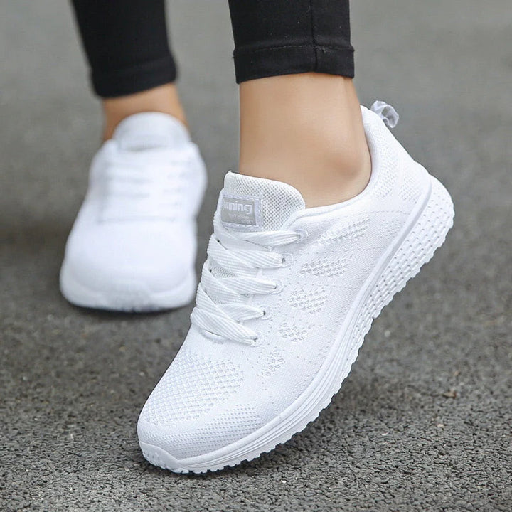 Women's Orthopedic Walking Shoes in white with breathable mesh upper and lace-up closure for supportive comfort