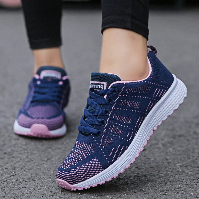 Women's supportive walking sneakers in white with breathable upper and wide toe box for natural foot shape