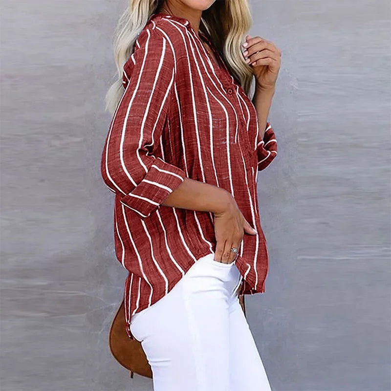 Detail shot of vertical stripe pattern and lightweight fabric drape on summer shirt