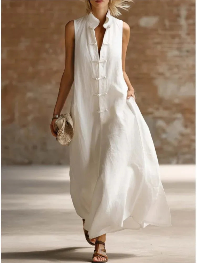 Detail of mandarin collar and frog button closure on sleeveless maxi dress