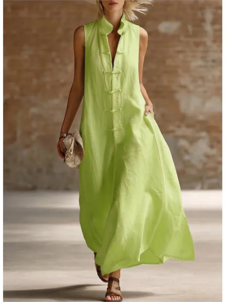 Back view of sleeveless maxi dress with relaxed drape and airy fabric