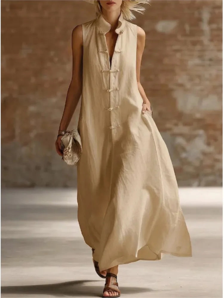 Full-length sleeveless maxi dress styled with sandals for casual summer wear
