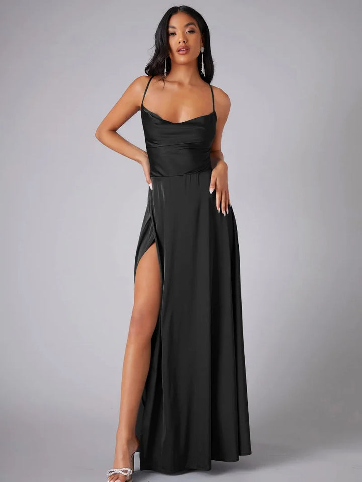 Three-quarter view of fitted bodice evening maxi dress with side slit