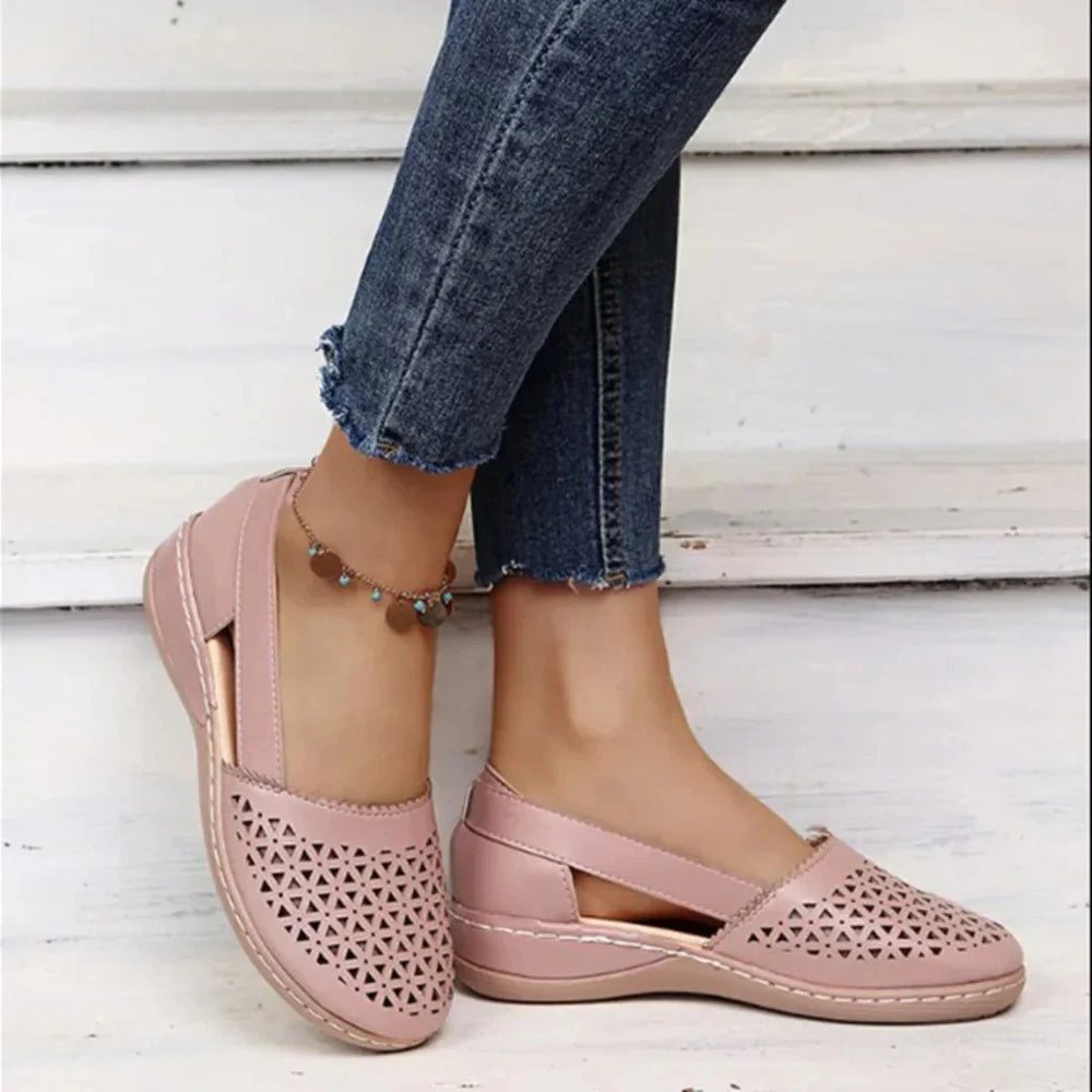 Close-up view of Women's Orthopedic Comfort Walking Shoes showing geometric laser-cut pattern on vamp
