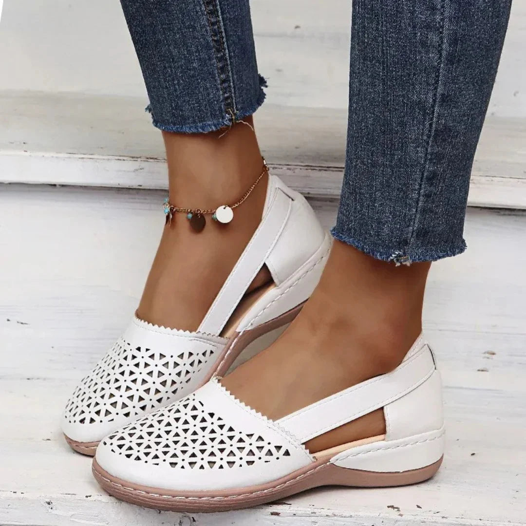Side profile of slip-on orthopedic walking shoes with elastic panels and cushioned footbed