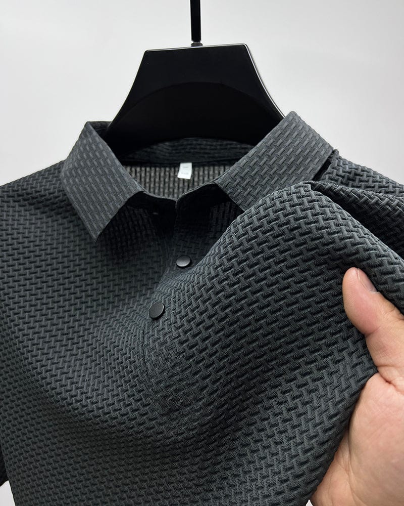 Men's button-up polo shirt in gray with textured mesh weave and classic collar detail