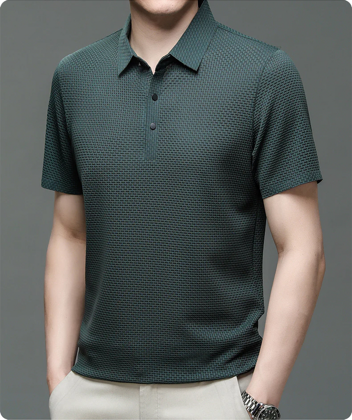 Detail of men's polo shirt placket with button closure and mesh texture