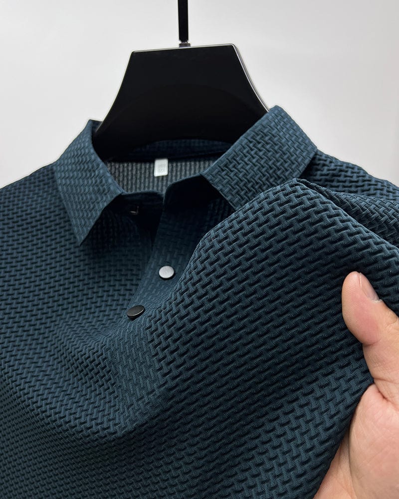 Close-up of men's polo shirt showing breathable mesh texture and button placket