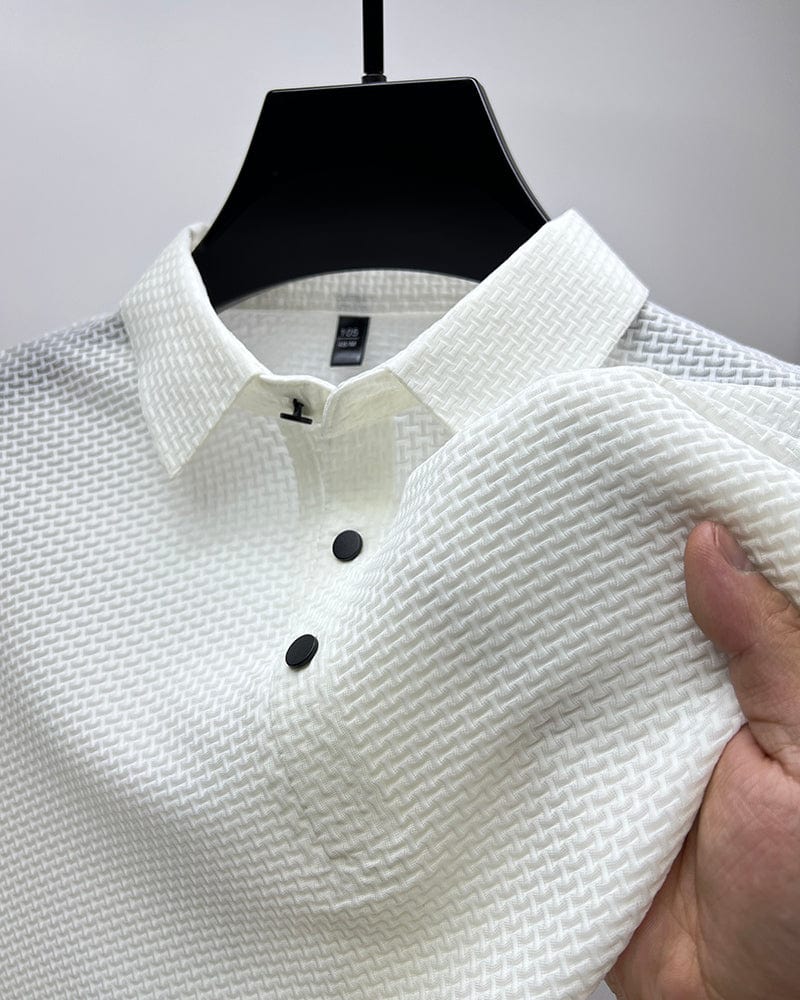 Detail view of textured mesh fabric on men's button-up polo shirt