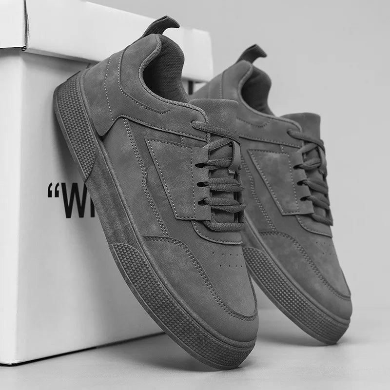 Detail shot of men's sneakers highlighting padded collar and soft interior lining