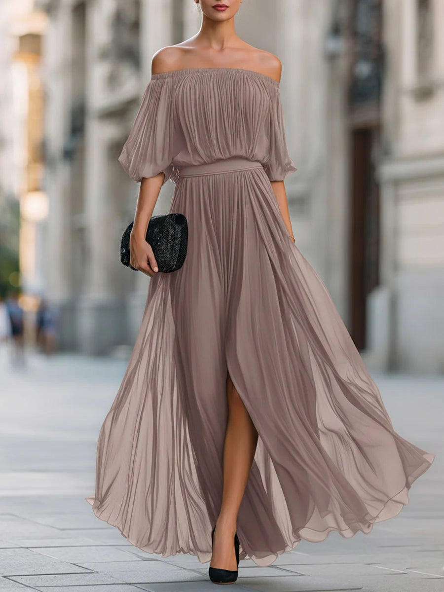 Woman styling off shoulder maxi dress with heels for wedding guest or evening event
