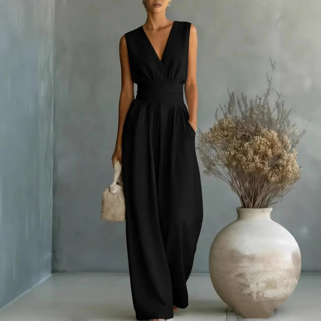 Full length sleeveless V neck jumpsuit with wide leg fit and structured waist detailing