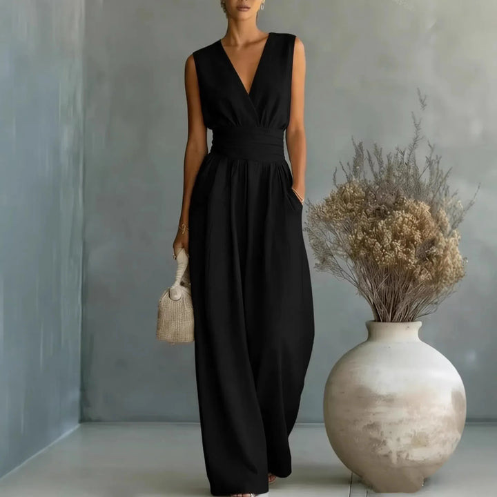 Full length sleeveless V neck jumpsuit with wide leg fit and structured waist detailing