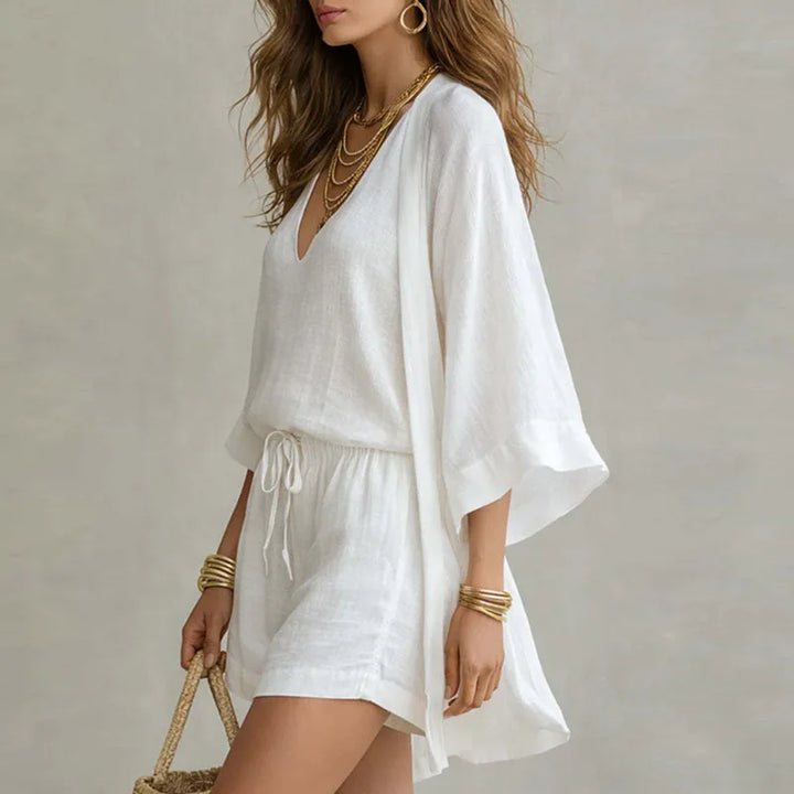Close-up view of the lightweight linen fabric and V-neck detail on the three piece co-ord set