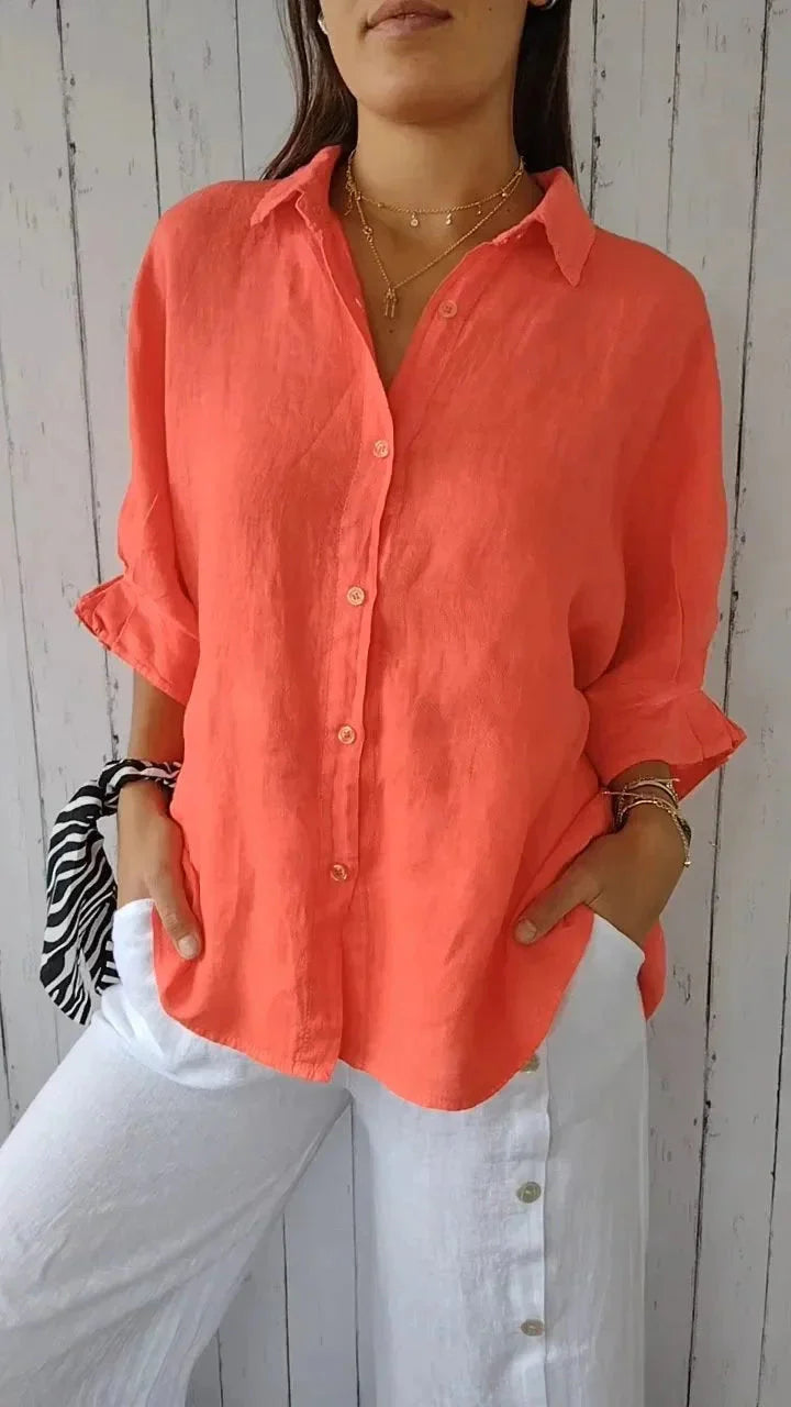 Side view of relaxed fit summer blouse with back slit and tie accent detail