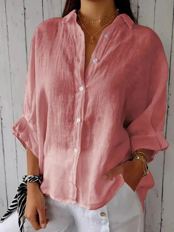 Women's breathable summer blouse in olive green styled with casual accessories and white bottoms