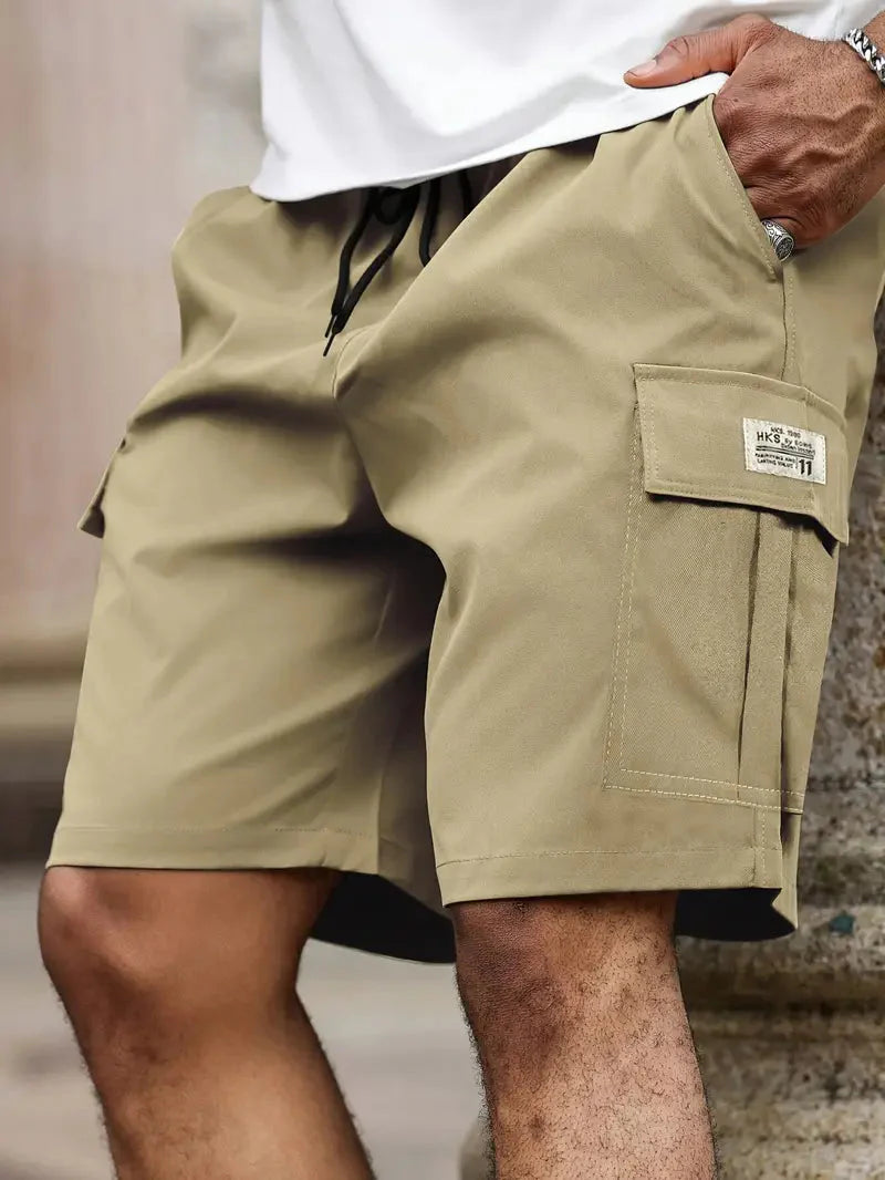 Side view of men's cargo chino shorts with functional cargo pockets and structured fabric