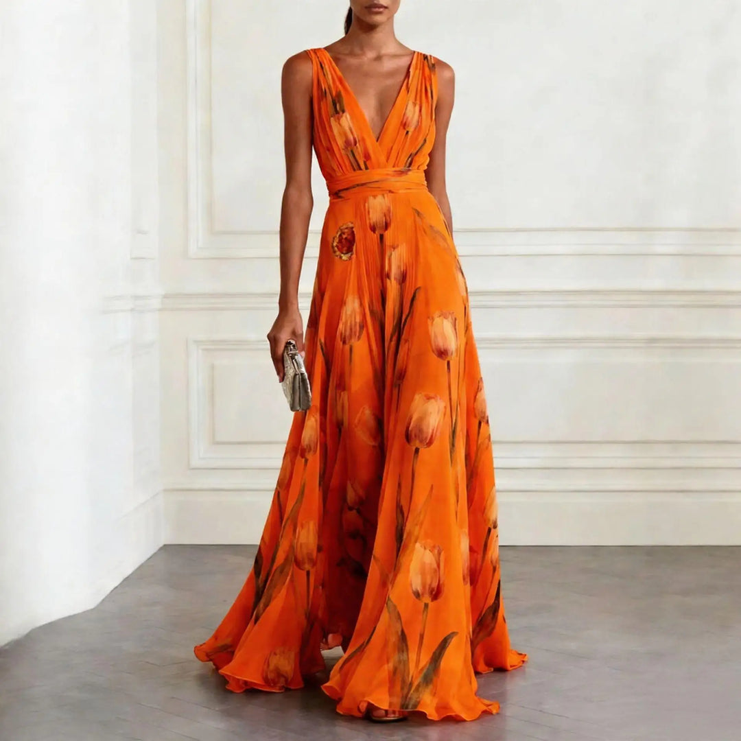 Close-up of V-neckline and wrap waist detail on floral maxi dress