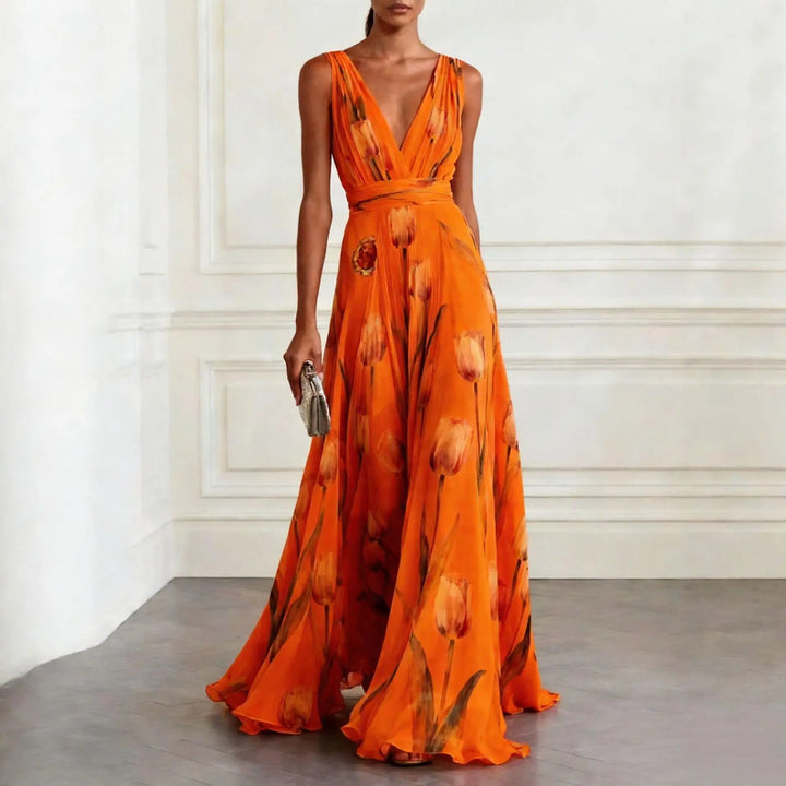Close-up of V-neckline and wrap waist detail on floral maxi dress