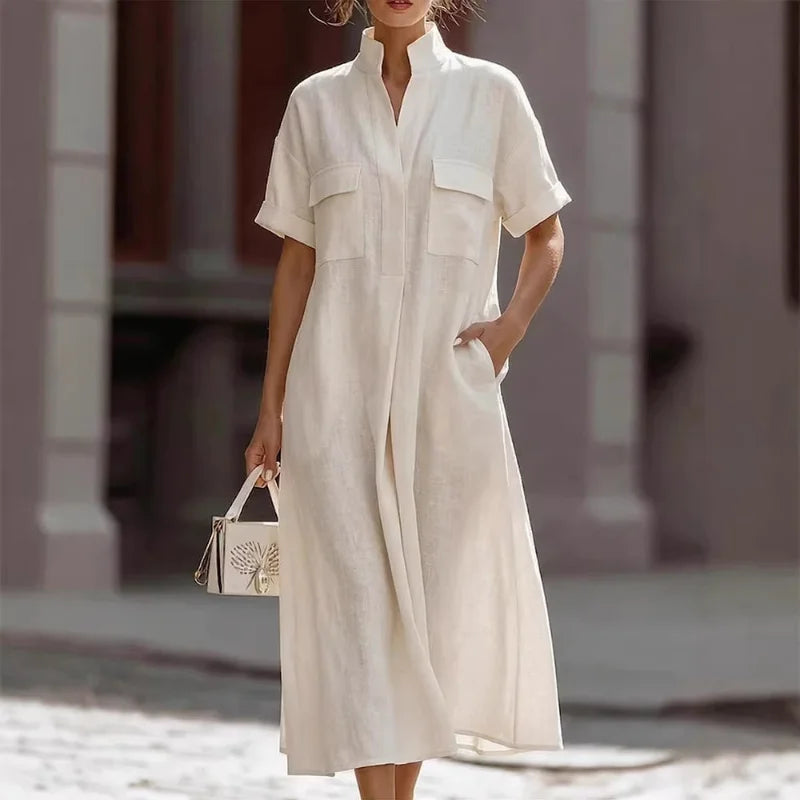 Side view of women's midi shirt dress showing flowing silhouette and side pockets