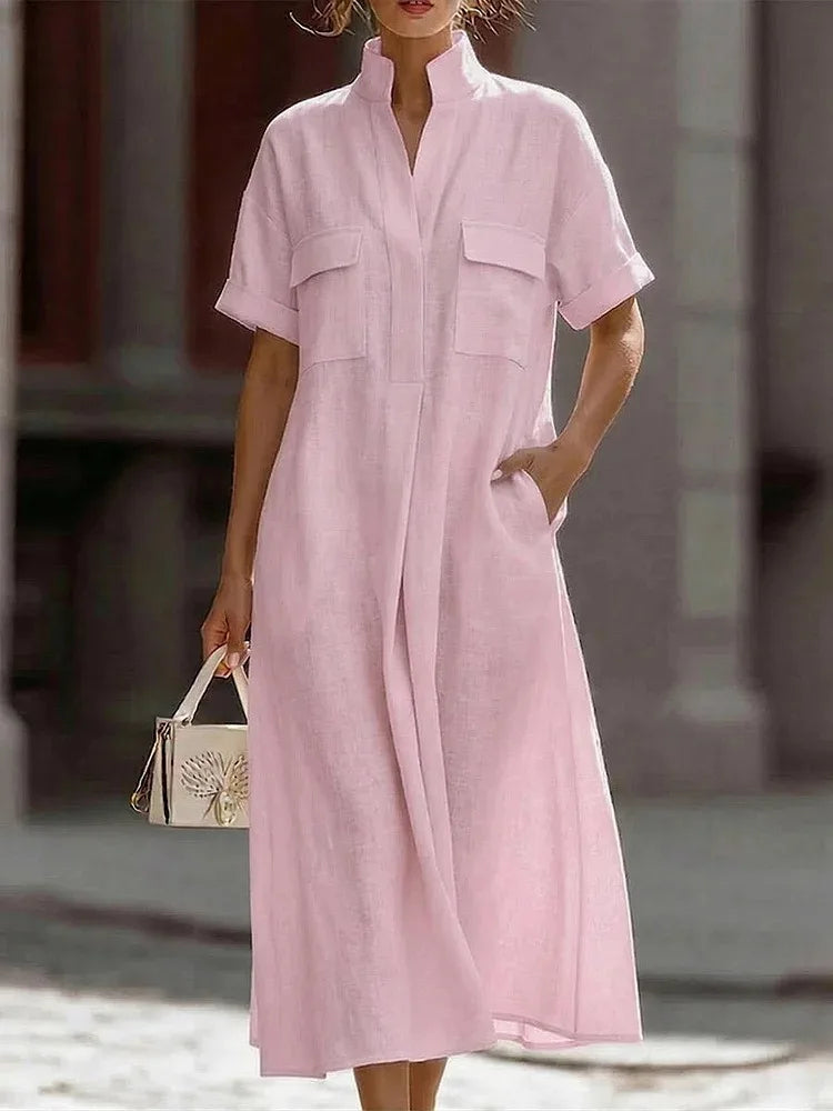 Women's shirt dress styled with sandals showing full-length relaxed silhouette