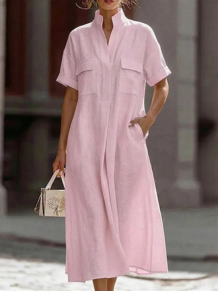 Women's shirt dress styled with sandals showing full-length relaxed silhouette