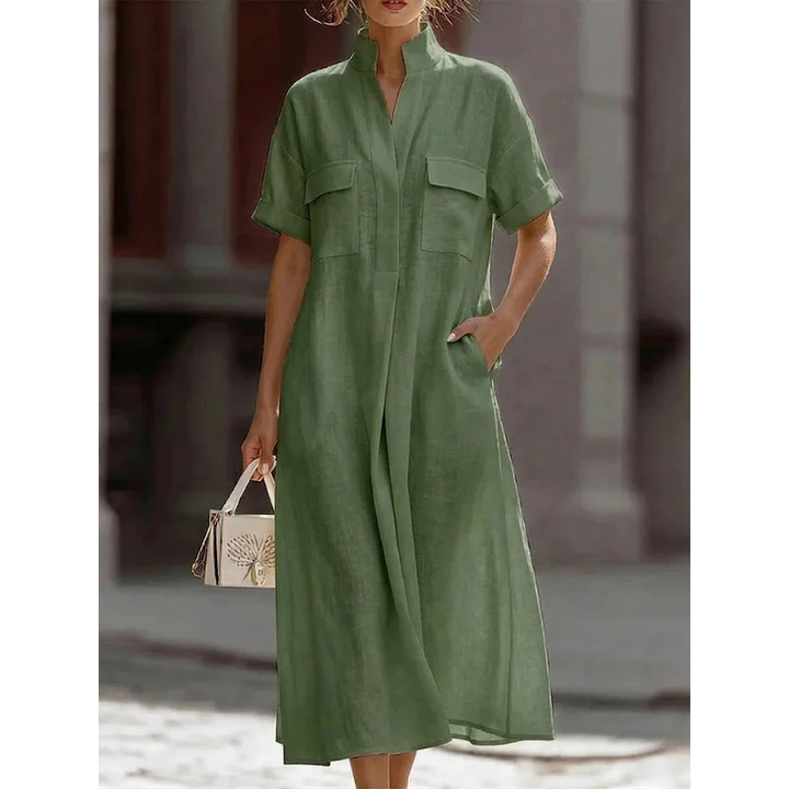 Detail of women's shirt dress stand collar and lightweight fabric drape