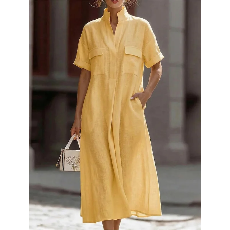 Women's midi shirt dress in light blue showing casual everyday styling