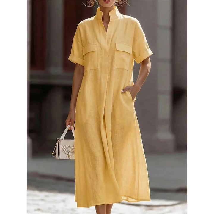 Women's midi shirt dress in light blue showing casual everyday styling